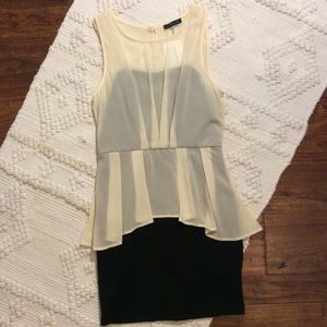 Boutique dress with peplum overlay